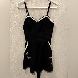 Voodoo Vixen Black Jumpsuit with White Floral Accents small